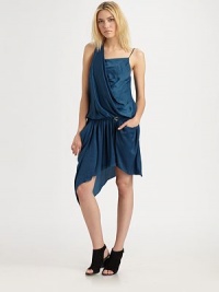 Lustrous and draped with gathered folds and a comely asymmetric hemline.Folded pleat at shoulderSingle spaghetti strapBlouson bodiceDropped waistSkinny buckled beltSlash pocketsAsymmetrical hemAbout 25 from natural waistPolyesterDry cleanMade in USA of imported fabricModel shown is 5'9½ (177cm) wearing US size 4. Lustrous and draped with gathered folds and a comely asymmetric hemline.Folded pleat at shoulderSingle spaghetti strapBlouson bodiceDropped waistSkinny buckled beltSlash pocketsAsymmetrical hemAbout 25 from natural waistPolyesterDry cleanMade in USA of imported fabricModel shown is 5'9½ (177cm) wearing US size 4.