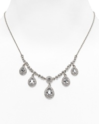 Dress up your evening gown with this dazzling vintage-inspired drop necklace from Carolee Luxe. Dress up your evening gown with this dazzling vintage-inspired drop necklace from Carolee Luxe.