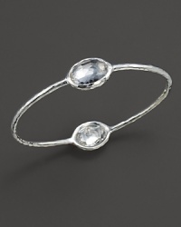 From the Silver collection, two clear quartz stations on a hammered bangle in sterling silver. Designed by Ippolita. From the Silver collection, two clear quartz stations on a hammered bangle in sterling silver. Designed by Ippolita.