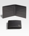 Leather wallet with dark palladium hardware.Six card slots and two bill compartments4W x 4HMade in Italy