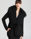 Go dressed-down chic or all-out glam in this versatile Vince cardigan, boasting a removable fur collar.