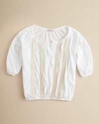 With a loose-fitting top that gathers at the sleeve and hem, this super-cute tunic looks great with leggings or skinny jeans. With a loose-fitting top that gathers at the sleeve and hem, this super-cute tunic looks great with leggings or skinny jeans.