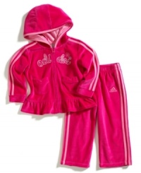 Show her just how soft of a spot you have for her with this cozy velour jacket and pant set from adidas. Show her just how soft of a spot you have for her with this cozy velour jacket and pant set from adidas.