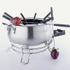 There's nothing quite as decadent as a fondue pot simmering with cheese or chocolate. Invite friends - this brushed stainless steel electric fondue pot is elegant enough for a party and comes with eight fondue forks. The thermostat adjusts to a wide range of temperature settings. Model# CFO-3SS. Manufacturer's limited 3-year warranty.