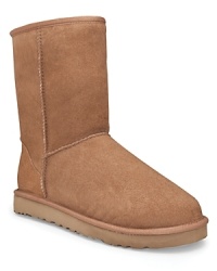 The signature pull-on boot from UGG® in soft sheepskin with suede heel guard. The signature pull-on boot from UGG® in soft sheepskin with suede heel guard.