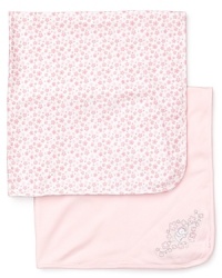 One solid and embroidered and one floral print, these luxe receiving blankets bring your little girl into the world in comfort and style. One solid and embroidered and one floral print, these luxe receiving blankets bring your little girl into the world in comfort and style.