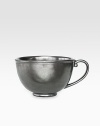 A unique mottling technique lends a hand-thumbed, hammered design to a beautiful metallic stoneware coffee cup with the look of an old-world favorite. From the Pewter Collection10-oz. capacity3H X 4½ diam.Ceramic stonewareDishwasher safeImported
