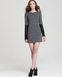 Exude modern edge in this 10 Crosby Derek Lam sweater dress boasting leather sleeves for downtown cool with uptown appeal. Exude modern edge in this 10 Crosby Derek Lam sweater dress boasting leather sleeves for downtown cool with uptown appeal.
