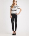 Coated cotton twill in a high-rise silhouette with skinny-leg construction. THE FITHigh-rise Skinny leg Rise, about 10 Inseam, about 28THE DETAILSZip fly Button closure Five-pocket style 92% cotton/7% polyester/1% spandex Dry clean Made in USA