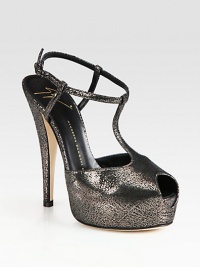 Secured by an adjustable ankle strap, this printed metallic suede sandal has a high platform, skinny heel and t-strap. Self-covered heel, 5 (125mm)Covered platform, 1 (25mm)Compares to a 4 heel (100mm)Printed metallic suede upperLeather lining and solePadded insoleMade in ItalyOUR FIT MODEL RECOMMENDS ordering one size up as this style runs small. Secured by an adjustable ankle strap, this printed metallic suede sandal has a high platform, skinny heel and t-strap. Self-covered heel, 5 (125mm)Covered platform, 1 (25mm)Compares to a 4 heel (100mm)Printed metallic suede upperLeather lining and solePadded insoleMade in ItalyOUR FIT MODEL RECOMMENDS ordering one size up as this style runs small.
