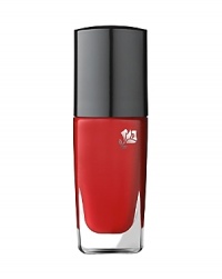 Inspired by the new trendy Rouge In Love lip collection, Vernis in Love is a high potency nail lacquer perfectly themed to complement every woman's mood and style. With ultimate brilliance, intense color and a mistake-free application, your nails will love the lasting shine and pop of color that stays put for days. Benefits:• Nails perfectly polished• High shine finish • Easy application Technology: • Multi-Polymers Complex provides a film that protects color and keeps nails perfectly polished• White Mica Lamellas reflect natural light for a high-shine finish• Grooved stem allows polish to flow directly to the center, while the elongated, round base distributes uniform color in a single stroke