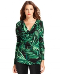 A tropically inspired botanic print lends a lush feel to this cowlneck top from MICAHEL Michael Kors. A tropically inspired botanic print lends a lush feel to this cowlneck top from MICAHEL Michael Kors.
