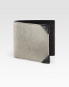 Crafted from lightly distressed lambskin leather, this sleek wallet features ample storage and the look of a well-worn favorite.One billfold compartmentSix card slotsLambskin5W x 4HImported
