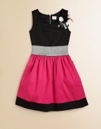 Tailored in airy cotton sateen, this girly colorblocked frock is beautifully complemented by a jewel and feather embellishment, metallic waistband and full skirt.BoatneckSleevelessExposed back zipperMetallic elastic waistbandFully lined97% cotton/3% spandexHand washMade in the USA