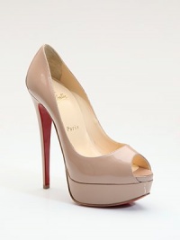 Sleek and sculptural, in gleaming patent leather on a graceful heel and a double platform.Leather-covered heel, 6 (150mm) Covered double platform, 1½ (40mm) Compares to a 4½ heel (115mm) Patent leather upper Open toe Leather lining Padded insole Signature red leather sole Made in ItalyOUR FIT MODEL RECOMMENDS ordering one size up as this style runs small. Sleek and sculptural, in gleaming patent leather on a graceful heel and a double platform.Leather-covered heel, 6 (150mm) Covered double platform, 1½ (40mm) Compares to a 4½ heel (115mm) Patent leather upper Open toe Leather lining Padded insole Signature red leather sole Made in ItalyOUR FIT MODEL RECOMMENDS ordering one size up as this style runs small.