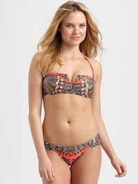 A plunge-worthy print on an ultra-sexy silhouette makes this a timeless swim design.Removable halter strapBack clasp closureRuched-side bottomFully lined80% nylon/20% spandexHand washMade in USA A plunge-worthy print on an ultra-sexy silhouette makes this a timeless swim design.Removable halter strapBack clasp closureRuched-side bottomFully lined80% nylon/20% spandexHand washMade in USA