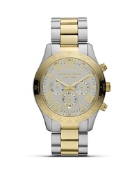 Adopt a considered approach to accessorizing with this two tone watch from MICHAEL Michael Kors. With an oversized bezel and bold markers, it's a clinic in practical yet polished design.