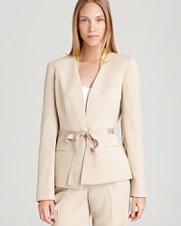 A contrast collar lends contemporary edge to a classic T Tahari jacket for a summer-fresh approach to your 9-to-5. A contrast collar lends contemporary edge to a classic T Tahari jacket for a summer-fresh approach to your 9-to-5.