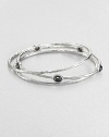 From the Rock Candy® Collection. A trio of hammered, sterling silver bangles accented with rich, faceted hematite. Sterling silverHematiteDiameter, about 2.5Slip-on styleImported 
