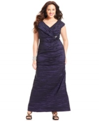 Alex Evenings' plus size evening gown was designed with a luxe texture, dramatic portrait collar and sparkling jewel embellishment. Alex Evenings' plus size evening gown was designed with a luxe texture, dramatic portrait collar and sparkling jewel embellishment.