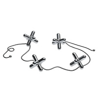 Trivet with movable pieces to look like jacks is designed by Gabriele Chiave. Trivet with movable pieces to look like jacks is designed by Gabriele Chiave.