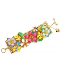 Breathe life into your look. Betsey Johnson's wide toggle bracelet combines a vibrant mix of multicolored enamel flowers and leaves, a snail and a butterfly in purple, pink, green, yellow and blue. Set in gold-plated mixed metal. Approximate length: 8 inches. Breathe life into your look. Betsey Johnson's wide toggle bracelet combines a vibrant mix of multicolored enamel flowers and leaves, a snail and a butterfly in purple, pink, green, yellow and blue. Set in gold-plated mixed metal. Approximate length: 8 inches.