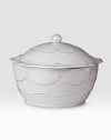 A beautiful, covered stoneware casserole is handcrafted to bring rustic detail and irresistibly romantic European charm to a dinner or party. 1.5-quart capacity 4H X 8 diam. Dishwasher, oven and freezer safe Imported