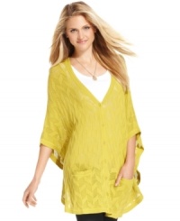 This open-knit sweater from Alfani is casually captivating with dolman sleeves and a slouchy fit. This open-knit sweater from Alfani is casually captivating with dolman sleeves and a slouchy fit.