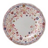 Delicate, swirling florals in a rich, warm palette add artful brightness to these weighty, durable earthenware dishes from Gien France.