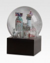 EXCLUSIVELY OURS. The Las Vegas musical snowglobe features city scenes and landmarks, including: Hoover DamStratosphereElvis impersonatorShowgirlsCasinoStatue of LibertyCasino-style Sphinx and PyramidPlays Luck Be A LadyImported