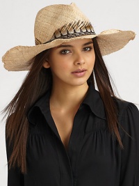 A highly textural design with a unique pheasant feather band and a frayed brim. StrawPheasant featherBrim, about 4¾Hand washMade in USA of imported fabrics A highly textural design with a unique pheasant feather band and a frayed brim. StrawPheasant featherBrim, about 4¾Hand washMade in USA of imported fabrics