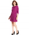This soft jersey dress from DKNYC features a pleated skirt with a swingy fit and flattering blouson-style bodice--pair with heels and jewels for a look that moves from day to night with ease! (Clearance)