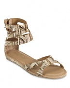 In snake embossed leather, these strappy Cole Haan flats lend a cool look--a gladiator silhouette feels of-the-moment.