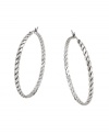 Get all tied up in traditional style with a modern twist. BCBGeneration adds a little extra flair to the classic hoop earring with a unique rope pattern. Crafted in oxidized silver tone mixed metal. Approximate diameter: 1-1/2 inches.