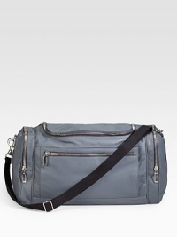 Versatile and stylish at once with the superior softness of nappa lambskin leather and outfitted with side pockets for ultimate convenience. Zip closure Adjustable canvas shoulder strap Interior zip, cell phone pockets Exterior zip, snap pockets 18.9W X 9.8H X 8.2D Made in Italy