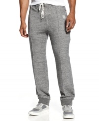 Pull yourself together. Keep it stylish even when you're working out with these track pants from Sean John. Pull yourself together. Keep it stylish even when you're working out with these track pants from Sean John.