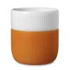 A celebration of Dutch minimalism, the Contrast mug fuses form and function, hard porcelain and soft silicone, vibrant colors and stark white to create a practical design for everyday life.