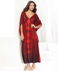 One World's Maxi caftan is loose, flowy, and fancy. With an elegant lace print and an easy v-neck, this floor-length style is nothing but comfortable. One World's Maxi caftan is loose, flowy, and fancy. With an elegant lace print and an easy v-neck, this floor-length style is nothing but comfortable.