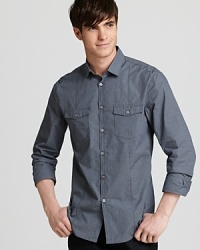 The double-pocket design boasts a military influence and darts in the front and back shape the silhouette for a slim fit. With an allover check pattern, this button-down offers a handsome high-design look for your casual cool wardrobe. The double-pocket design boasts a military influence and darts in the front and back shape the silhouette for a slim fit. With an allover check pattern, this button-down offers a handsome high-design look for your casual cool wardrobe.