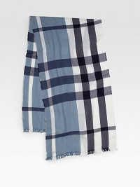 A luxurious winter essential is enhanced with a bold plaid design.Fringed ends20W x 74H55% wool/45% cashmereDry cleanMade in Scotland A luxurious winter essential is enhanced with a bold plaid design.Fringed ends20W x 74H55% wool/45% cashmereDry cleanMade in Scotland