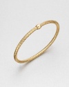 A simple, yet beautiful design with a single bead on a textured mesh bangle. 18k goldLength, about 7Slip-on designMade in Italy 