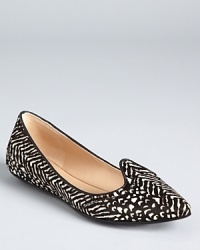 In an abstract print, Belle by Sigerson Morrison's smoking flats showcase the brand's unmistakable silhouette. In an abstract print, Belle by Sigerson Morrison's smoking flats showcase the brand's unmistakable silhouette.