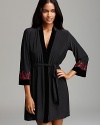 With velour trim and Spanish-style embroidery, this silky wrap from In Bloom by Jonquil is a luxe addition to your at-home wardrobe.