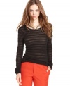 Allover burnout stripes add on-trend texture to this RACHEL Rachel Roy top -- a hot layering piece!