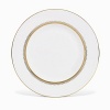 Rings of gold adorn fine white bone china with the lustrous shine of a wedding band. White bone china features two different border trims of gold, a wide corded border of textured grosgrain ribbon on some pieces, a narrow edge on others.
