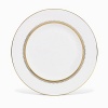 Rings of gold adorn fine white bone china with the lustrous shine of a wedding band. White bone china features two different border trims of gold, a wide corded border of textured grosgrain ribbon on some pieces, a narrow edge on others.