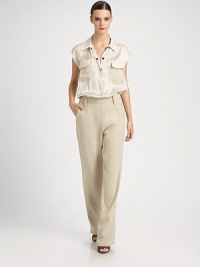 This chic, fluid design gives the illusion of cleverly paired separates.Point collarSleevelessConcealed button frontPatch flap pocketsBanded waist with belt loopsInseam, about 34PolyesterDry cleanMade in ItalyModel shown is 5'9½ (176cm) wearing US size 4. This chic, fluid design gives the illusion of cleverly paired separates.Point collarSleevelessConcealed button frontPatch flap pocketsBanded waist with belt loopsInseam, about 34PolyesterDry cleanMade in ItalyModel shown is 5'9½ (176cm) wearing US size 4.