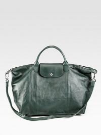 A classic iconic style, now in luxurious leather with a versatile strap.Double top handles, 4 dropDetachable shoulder strap, 21 dropTop zip closureOne inside zip pocketTwo inside open pocketsFully lined15W X 12H X 7DImported A classic iconic style, now in luxurious leather with a versatile strap.Double top handles, 4 dropDetachable shoulder strap, 21 dropTop zip closureOne inside zip pocketTwo inside open pocketsFully lined15W X 12H X 7DImported