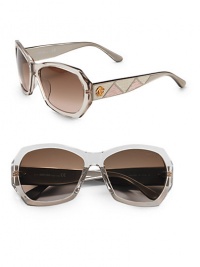 THE LOOKRounded geometric shapeAcetate frames Logo temple with faux lizard skin details Logo etched on lensLogo accented end-pieces Gradient lensesUV protective Signature case includedORIGINMade in Italy THE LOOKRounded geometric shapeAcetate frames Logo temple with faux lizard skin details Logo etched on lensLogo accented end-pieces Gradient lensesUV protective Signature case includedORIGINMade in Italy