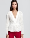 This Armani Collezioni jacket boasts a sophisticated, softly structured silhouette for undeniable elegance.